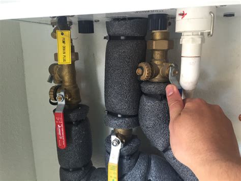 How To Flush A Tankless Water Heater And Clean The Air Intake Filter 7 Steps With Pictures