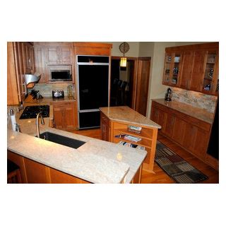 Stacked Stone Tile Backsplash And Millennium Cream Granite Cocina