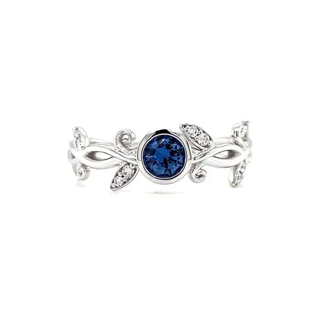 14KT WHITE GOLD YOGO SAPPHIRE AND DIAMOND RING Bakers Jewelry