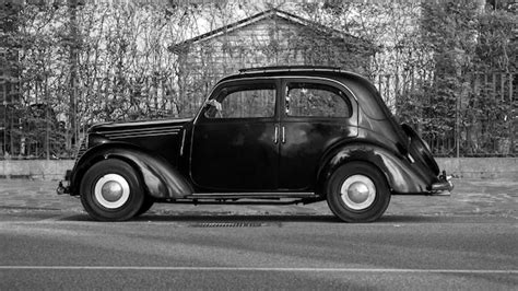 Premium Photo Vintage Car Parked On Road