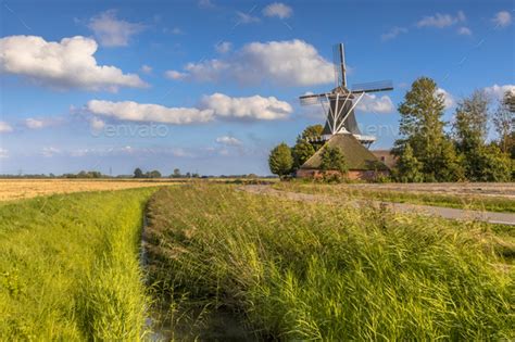 Typical Dutch Landscape Windmill Stock Photo By Creativenature Nl