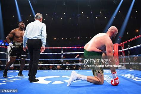 Tyson Fury Reacts To Being Knocked Down By Francis Ngannou During The News Photo Getty Images