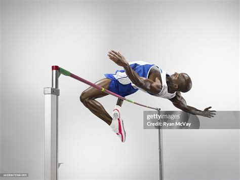 Man Jumping Over High Jump Studio Shot High-Res Stock Photo - Getty Images