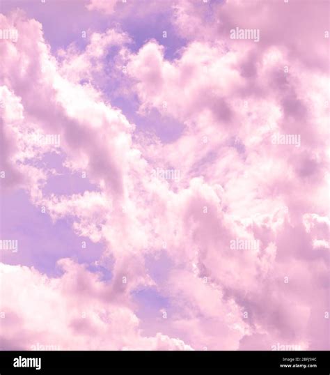 Lilac sky background with clouds Stock Photo - Alamy