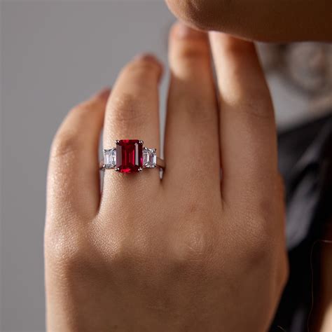 X Mm Emerald Cut Created Ruby And Ctw Lab Grown Diamond Three