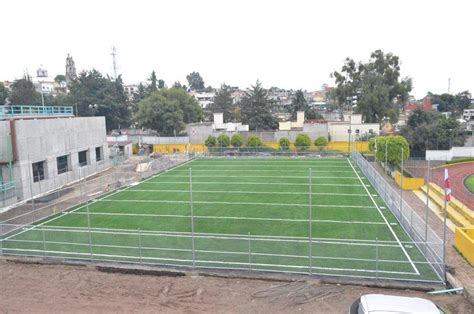 Todo sobre canchas de tochito bandera con pasto sintético