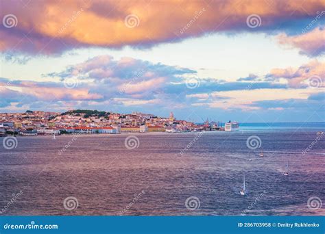 View Of Lisbon View Over Tagus River With Yachts And Boats On Sunset