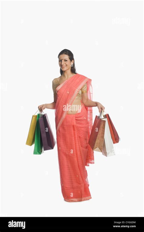 Woman Carrying Shopping Bags Stock Photo Alamy