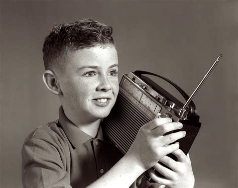 1960s Boy Listening To Portable Radio Photograph by Vintage Images