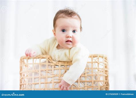 Beautiful Baby Smiling Out Of A Wicker Basket Stock Image Image Of