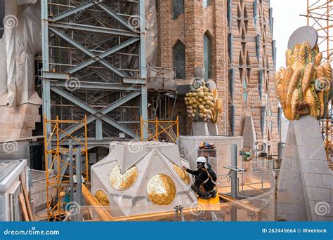 Construction Worker Working On Detailed Decorating Golden Pieces At