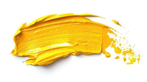 Premium Photo Vibrant Yellow Paint Stroke On White Background