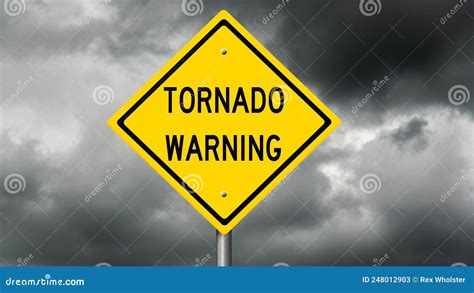 Yellow Tornado Warning Sign And Dark Clouds Stock Image Image Of