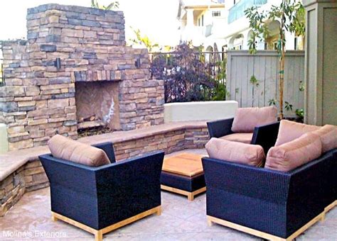 Outdoor fireplace and seating area. | Outdoor living space, Outdoor ...