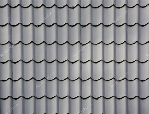 Grey Roof tiles Stock Photo by ©LehaKoK 73415215