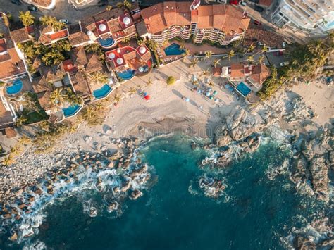 Wide Aerial View Of Conchas Chinas Beach In Puerto Vallarta Mexico