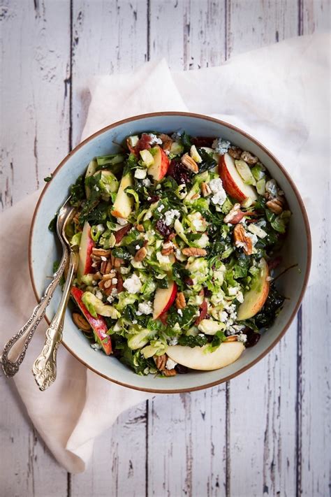 Shredded Brussels Sprouts And Kale Salad With Apple Gorgonzola And Candied