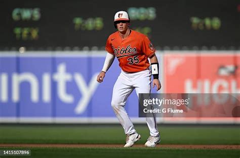 Adley Rutschman Of The Baltimore Orioles Takes A Lead Off Of First