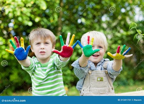 Two Boys Having Fun And Showing Colorful Hands Stock Image Image Of