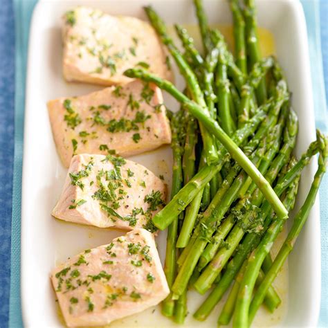 Citrus Poached Salmon with Asparagus Recipe - EatingWell