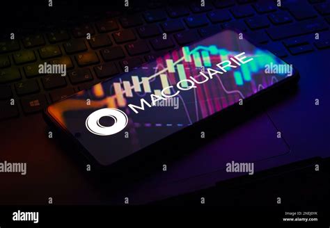 In this photo illustration the Macquarie Bank Limited logo seen displayed on a smartphone Stock ...