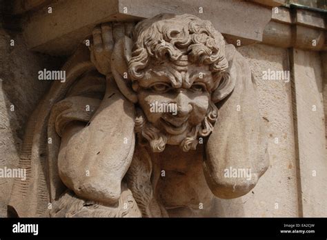 Rococo Statue Of A Satyr On The Facade Of The Zwinger Palace In Dresden