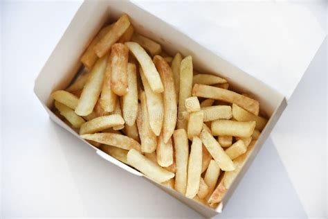 French Fries In A Cardboard Box Fast Food Fried Potatoes Stock Photo