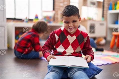 Two Kids Reading Book Sitting on Floor at Kindergarten Stock Image - Image of blond, adorable ...