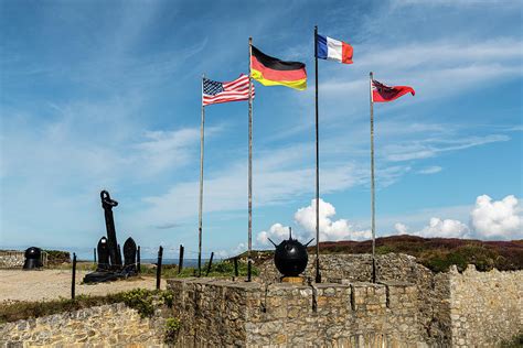 Flags near a memorial of World War 2 Photograph by Stefan Rotter - Pixels