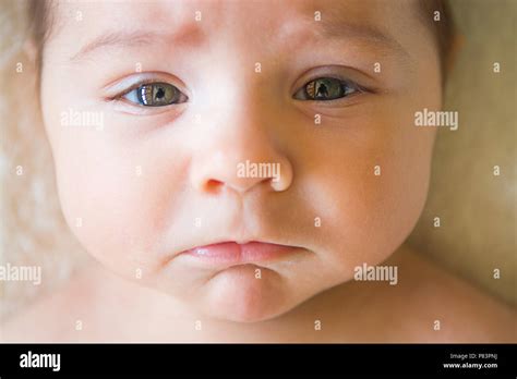 Sad baby face hi-res stock photography and images - Alamy