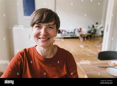 Happy Mature Woman With Short Hair At Home Stock Photo Alamy