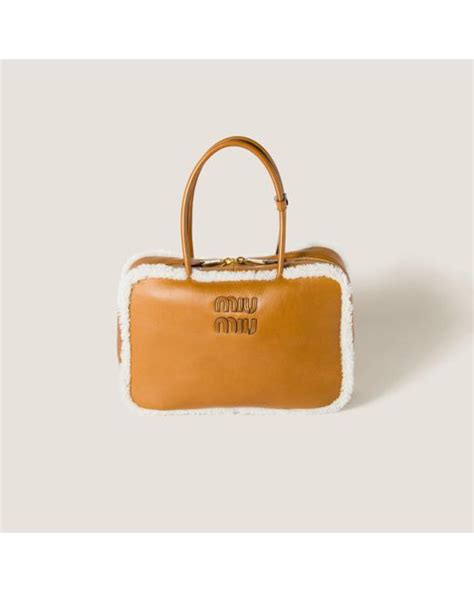 Miu Miu Beau Shearling Top Handle Bag In Metallic Lyst