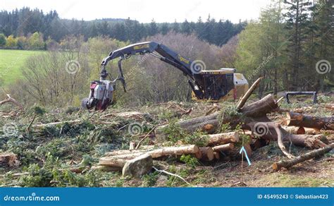 Tree cutting machine editorial stock photo. Image of cutting - 45495243