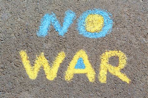 Words No War Written With Blue And Yellow Chalks On Asphalt Outdoors