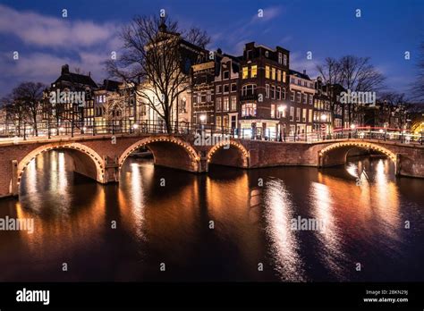 Atmospheric View Of The Famous Amsterdam Canals And Traditional Dutch