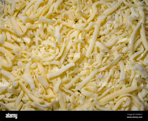 Grated mozzarella cheese hi-res stock photography and images - Alamy