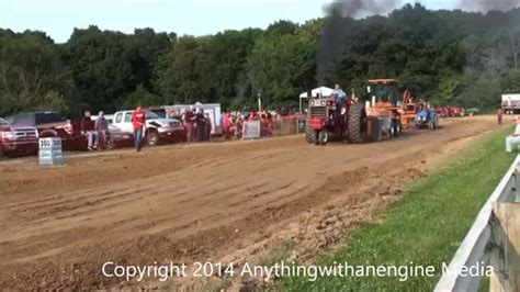 KIM WAGNER PULLS IN FIELD FARM TRACTOR CLASS MTTP PULLS ST JOHNS