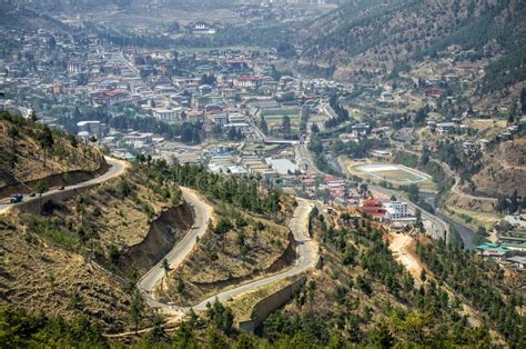 The Winding Hill Road And Aerial View Of Thimphu City In Bhutan Stock