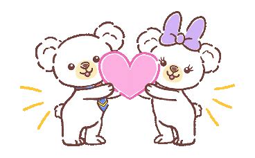 Two Teddy Bears Holding A Heart With The Word Love Written On It In