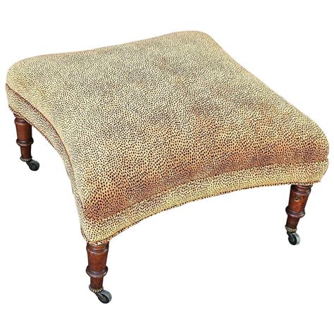 English Upholstered Ottoman on Mahogany Legs at 1stDibs