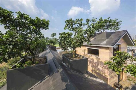 Fruit Trees Grow On The Roofs Of This Rammed Earth Home In Hanoi