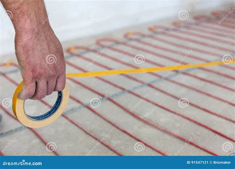 Electric Floor Heating System Installation in New House Stock Image ...