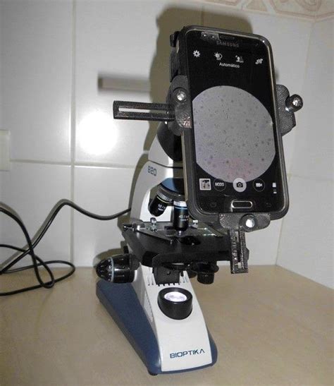 Cell phone attached to a LED light microscope by a universal smartphone ...