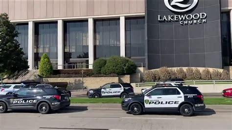 Heavy police presence outside Lakewood Church after shooting | khou.com