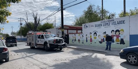 Policía movilización en una escuela primaria de la colonia El Olmo