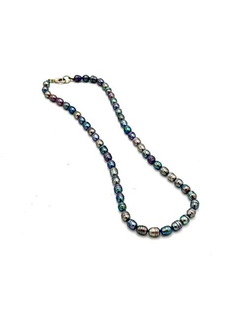 Scored Freshwater Seed Pearl Necklace Gem