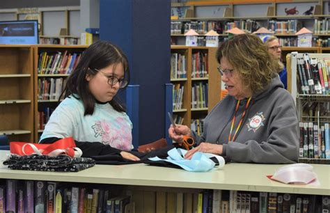 Whittier Middle School students sew their own ribbon skirts during Oceti Sakowin class