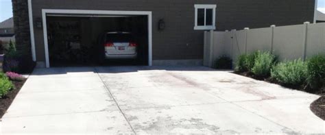 how much does it cost to repair concrete driveway