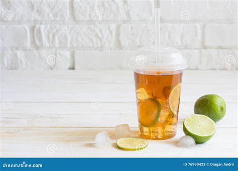 Iced Tea In A Plastic Cup With Straw With Slice Of Lime. White W Stock Image - Image of fresh ...