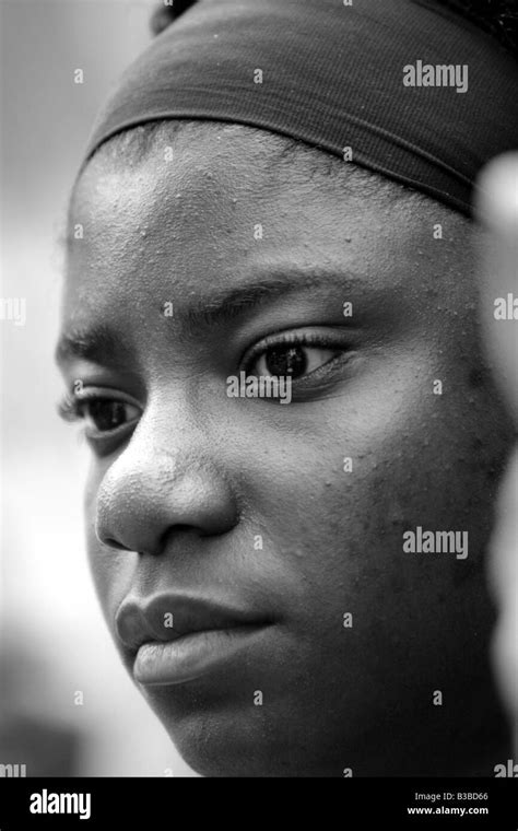 sad face sombre sad somber youth young black race Stock Photo - Alamy